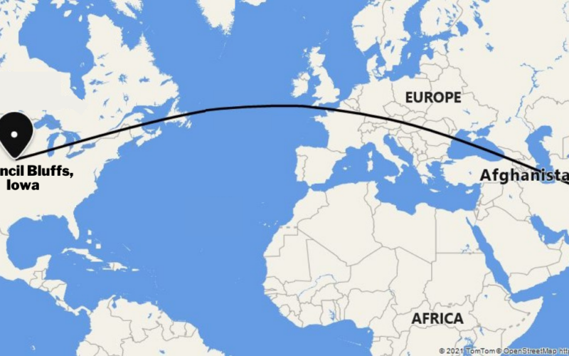 A Picture Of A World Map Showing The Distance Between Afghanistan & Council Bluffs.