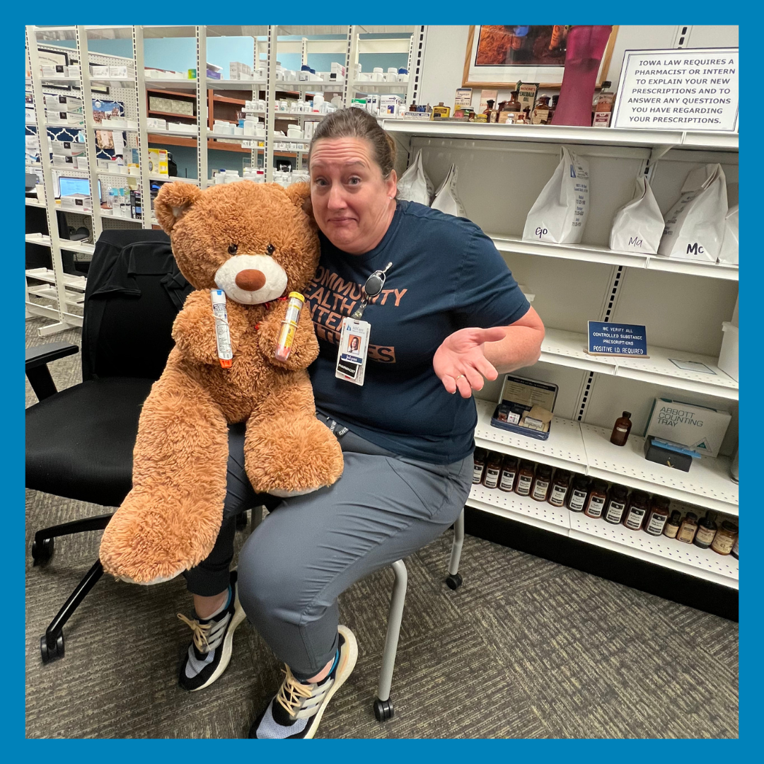 Bennie the bear learning about an EpiPen during their visit during National Teddy Bear Day.